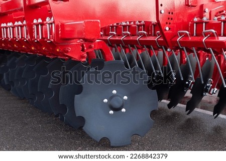 Trailed in-line disc harrow at an agricultural exhibition