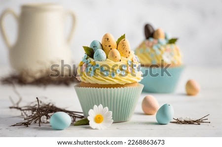 Decorated Cupcakes for Easter celebrations, pastel colors and shallow focus.  Royalty-Free Stock Photo #2268863673