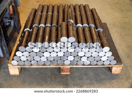 Round steel shaft, raw material for automotive parts,concept of logistics,raw material handling concept,Forklift transport concept



