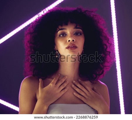 Neon light, fashion woman and beauty portrait in studio with purple uv for makeup, cosmetics and self love. Face of aesthetic gen z model black person on gray background for natural art glow on skin
