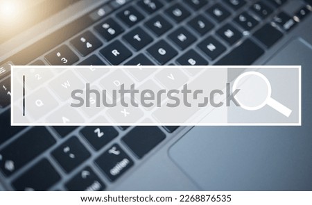Laptop, keyboard and search bar for research, question or query on information, data or knowledge on website, internet or app. IoT computer for browsing, online lookup, inquiry or web on mockup Royalty-Free Stock Photo #2268876535