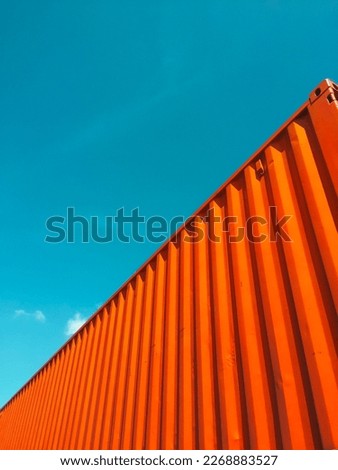 Orange  containers and sky for copy space about shipping Royalty-Free Stock Photo #2268883527