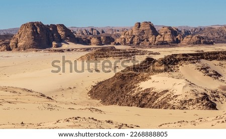 Sinai desert. Yellow and orange sandstone textured carved mountain, bright blue sky. Egyptian desert landscape. Sinai peninsula, Egypt Royalty-Free Stock Photo #2268888805