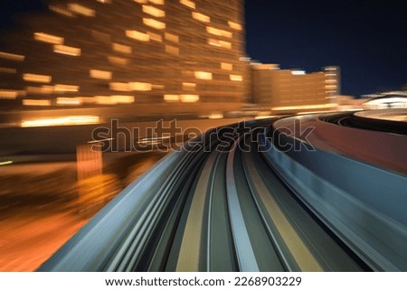 Motion blurred of train moving inside tunnel with daylight in tokyo, Japan.