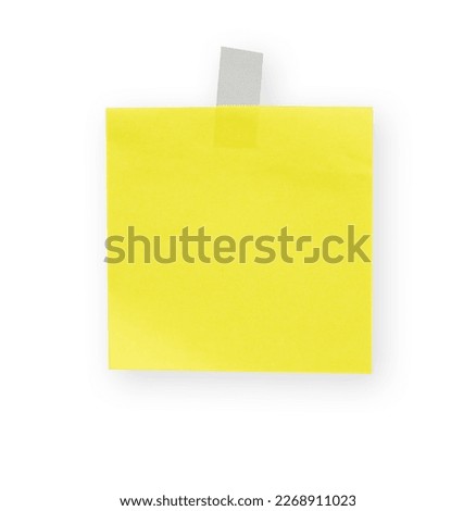 yellow sticky note with transparent tape
