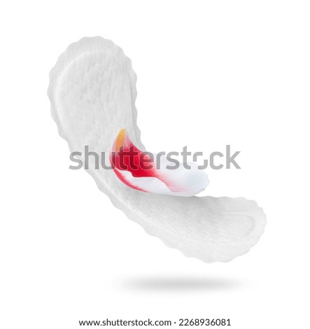 Women panty liner pad with a tulip petal closeup isolated on white background