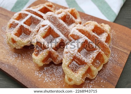 Mouthwatering Croffle or Croissant Waffles Sprinkled with Powdered Sugar