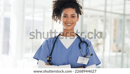 African American Women, face and doctor smile for healthcare, vision or career ambition and advice at the hospital. Portrait of happy and confident Japanese medical expert smiling, phd or medicare at Royalty-Free Stock Photo #2268944627
