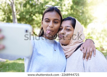 Girl, friends and muslim for funny face selfie with smile, hug or happy for summer, adventure or outdoor bonding. Women, hijab and profile picture on social media app, happiness or together in nature