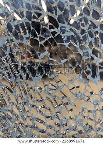 Cracks on glass texture. Broken transparent glass