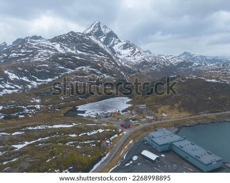 White snow mountain in Lofoten islands, Nordland county, Norway, Europe. Hills and trees, nature landscape in winter season. Winter background. Royalty-Free Stock Photo #2268998895