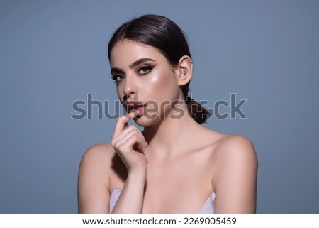 Beauty skin. Woman beauty face, clean fresh skin natural makeup, beauty eyes and lips of female photo model. Beautiful woman with fresh healthy skin, isolated on studio background. Beauty cosmetics.