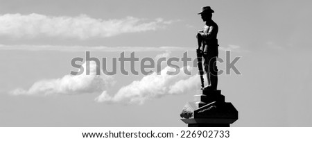 Silhouette of Australian soldier sculpture from WW2 in ANZAC Square in Broadwater Parklands Gold Coast Queensland Australia. No people. Copy space Royalty-Free Stock Photo #226902733