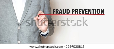 fraud prevention words made with marker and businessman