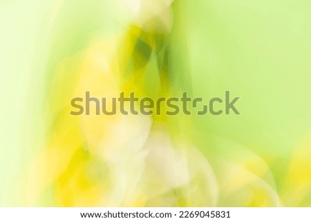abstract blurred green, black, white and yellow spring background