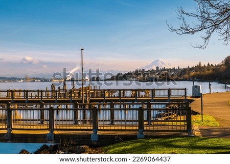 Long Exposure shot of trestle bridge  with Mount Rainier in the background. Tacoma water front