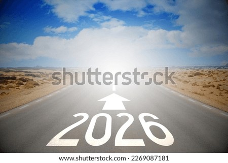 2026 - empty road on a desert and clouds on a sky Royalty-Free Stock Photo #2269087181