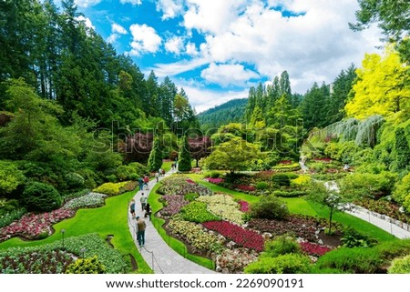 Victoria, British Columbia, Canada - Tourists at Butchart Gardens Sunken Garden Royalty-Free Stock Photo #2269090191