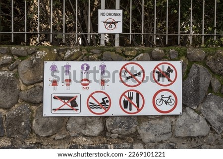 Various prohibition signs near biblical places on the Sea of Galilee in Israel