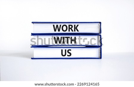 Work with us symbol. Concept words Work with us on books on a beautiful white table white background. Business, motivational and work with us concept. Copy space.