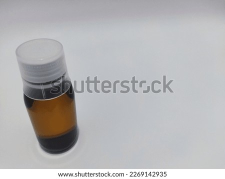 medicine syrup in glass bottles