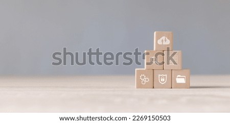 Wood cube block stacking with icon about cloud computing upload and download to cloud, online connection database digital. Innovation and technology transformation concept. Copy space.
