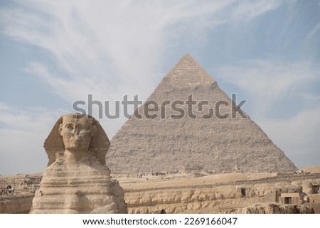 The Great Sphinx of Giza with the Great Pyramid in the Background