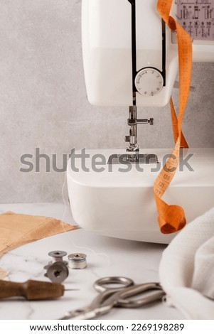 tailoring tools and accessories on table. tailor's tools, tailor's items, tailoring items. Royalty-Free Stock Photo #2269198289