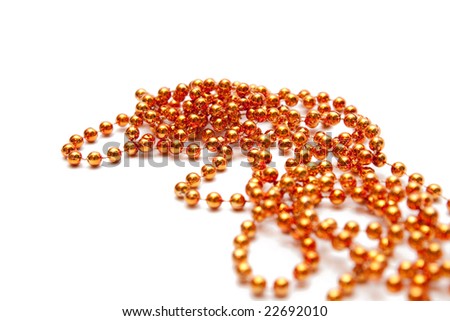 golden beads isolated on white