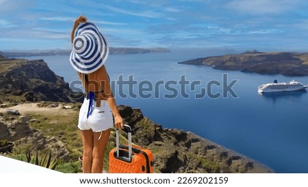 Summer holiday with  young woman in hat at  happy freedom lifestyle in Aegean sea mediterranean at Santorini,greece