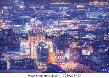 View of the city from the observation deck to skyscrapers in the light of night lights, the Ministry of Foreign Affairs and the Cathedral of Christ the Savior, Moscow City  Royalty-Free Stock Photo #2269215717
