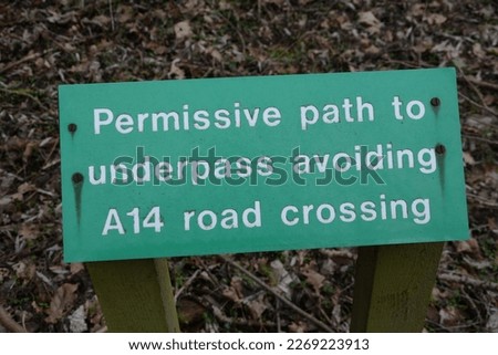 A sign indicating to walkers that the Permissive Path to the Underpass under the A14 Dual Carriageway should be taken, Barham,  Suffolk, England, UK - 2023