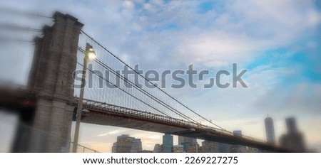 Sunset colors of Brooklyn Bridge and Lower Manhattan, New York.