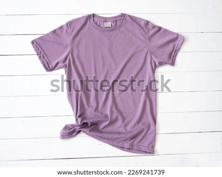 Purple T Shirt mockup on white wood background shirt template
