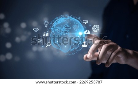 Businessman hand touching global icon big data digital link technology application online internet connection marketing business concept finance and banking global success Royalty-Free Stock Photo #2269253787