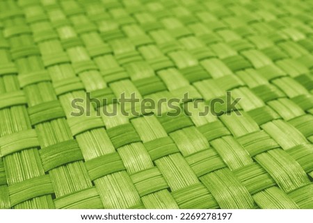Criss-crossed blades of grass background