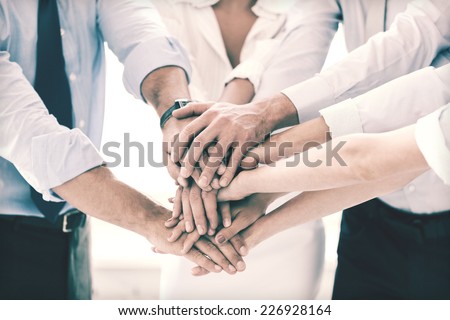 success and winning concept - happy business team celebrating victory in office Royalty-Free Stock Photo #226928164