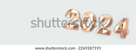 Banner with 2024 gold colored numbers on a blue background. New Year concept with place for text.