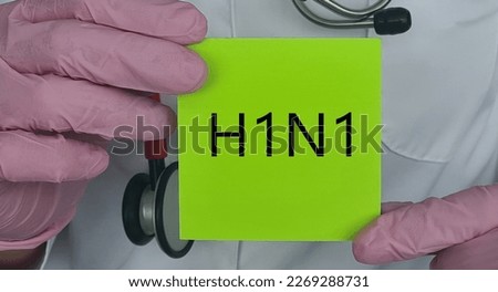 H1N1 card in hands of infectious disease therapist in clinic. Swine flu causes symptoms and treatment