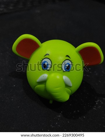 Green elephant head replica toy Bogor, Indonesia March 3 Th, 2023