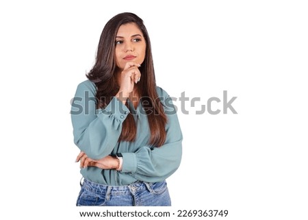 Horizontal photo. Beautiful Brazilian woman, with casual clothes, Jeans and green shirt. sign of reflection, thinking.