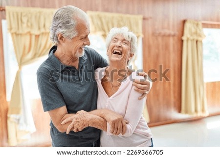 Senior couple in love having fun and laughing together as concept of friendship and love in old age Royalty-Free Stock Photo #2269366705