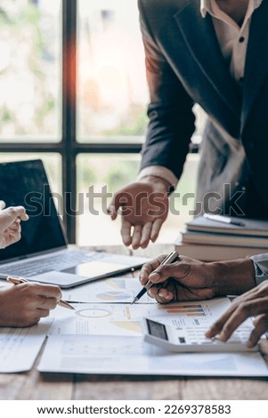 Consulting between bookkeepers and business lawyers on assets, balance sheets, stock market statistics. and annual tax law Protect your business from bribery in the office. vertical image