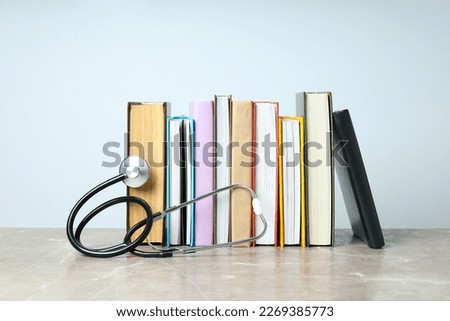 Concept of medical education and medical books Royalty-Free Stock Photo #2269385773