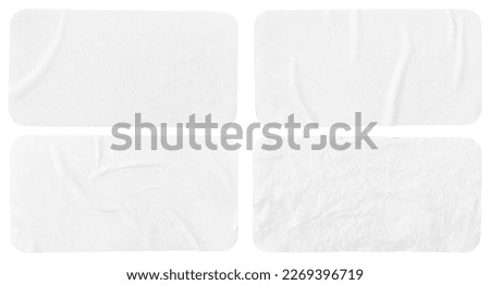 Set of four crumpled paper sheets, each of which is isolated on white background. Rectangle shape has rounded edges. Template mockup