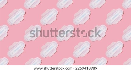 Women's pads pattern. Feminine hygiene items. Royalty-Free Stock Photo #2269418989