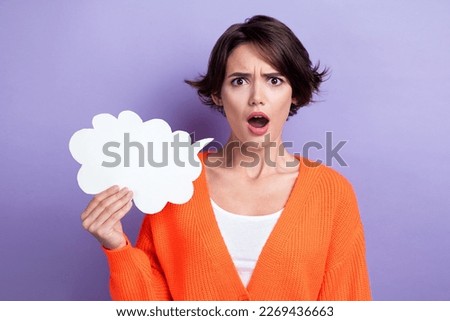 Photo of crazy speechless lady arm hold empty space cloud figure card open mouth isolated on violet color background