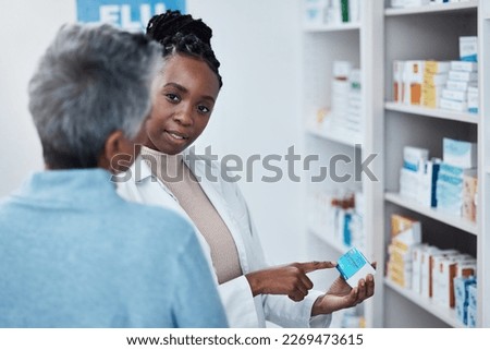 Pharmacy, black woman pharmacist and elderly patient with medication discussion of side effect. Medical clinic, doctor and pharmaceutical drugs with a healthcare, wellness and health employee at work