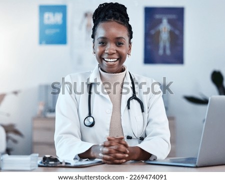 Black woman, doctor in portrait and healthcare, smile in office and laptop, medical professional and happy in career. Female physician, hands and health mindset with cardiologist at clinic and leader Royalty-Free Stock Photo #2269474091
