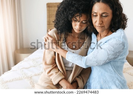 Black women hug, comfort and sad with empathy, kindness and mental health, love with grief and loss. Depression, mother and adult daughter with compassion and care, family and support with trust Royalty-Free Stock Photo #2269474483